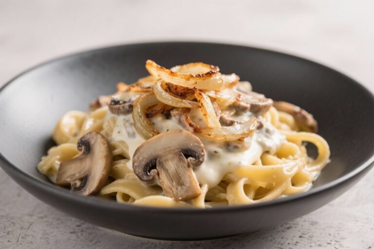 Caramelized Onion and Mushroom Pasta with Creamy Sauce – Cozy, Savory, and Weeknight-Friendly